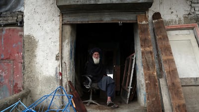 A carpenter waits for customers in Kabul, Afghanistan. AP Photo