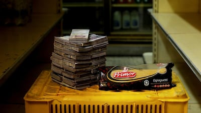 A packet of pasta is pictured next to 2,500,000 bolivars