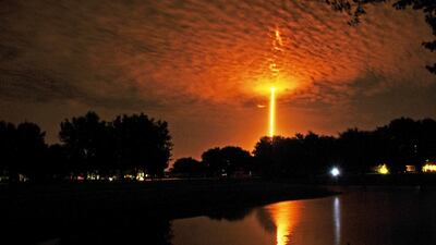 SpaceX Falcon 9 launches from Cape Canaveral, as seen from Woodside park in Viera, Florida. Tim Shortt / Florida Today via AP