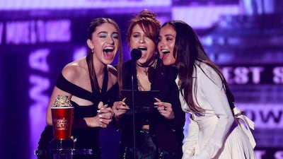 From left to right: actresses Rachel Sennott, Maria Bakalova, and Chase Sui Wonders announce a winner on stage. AFP