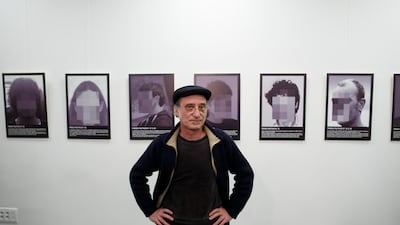 Spanish artist Santiago Sierra poses for press as he presents a reproduction of his work 'Political prisoners of contemporary Spain' at Anselmo Lorenzo Libertarian Studies Foundation after it was removed from ARCO art fair in February 2018 in Madrid, Spain. Photo / Getty