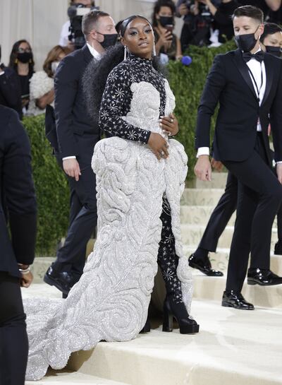 Simone Biles arriving at the 2021 Met Gala. Her dress weighed about 40kg. EPA