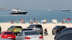 People enjoying their holiday at the Sufouh beach in Dubai. Pawan Singh / The National