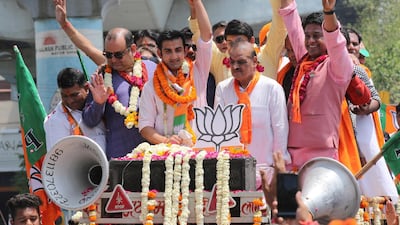 Former India batsman Gautam Gambhir, second from left, is running for election. Rajat Gupta / EPA