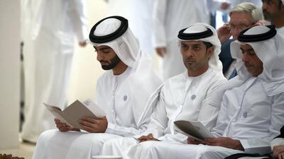 Sheikh Humaid bin Ammar, Sheikh Abdulaziz bin Humaid and Sheikh Saif bin Zayed attend a lecture by Razan Al Mubarak on Wednesday. Hamad Al Kaabi / Crown Prince Court - Abu Dhabi