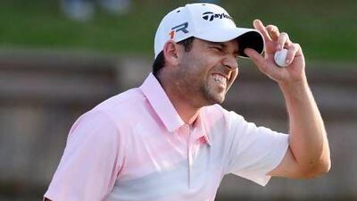 Sergio Garcia reacts after his final putt on the 18th green during the final round of The Players Championship at TPC Sawgrass on Sunday. Garcia finished tied for 8th place at 7-under-par. Erik S Lesser / EPA