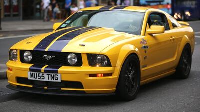 A Ford Mustang drives through Kensington, London, one of many supercars owned by wealthy Arab tourists which descend on the capital over the summer months. Dan Kitwood / Getty Images