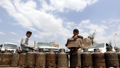 Yemenis with empty cooking gas cylinders wait for gas supplies to arrive at a street amid cooking gas shortages in Sana'a, Yemen. EPA