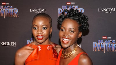 Danai Gurira, left, and Lupita Nyong'o attend Black Panther Welcome to Wakanda New York Fashion Week Showcase at Industria on Monday, Feb. 11, 2018, in New York. AP