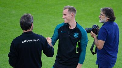 Barcelona’s goalkeeper Marc-Andre ter Stegen, centre, attends a training session. Roberto Pfeil / AFP