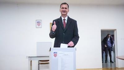Presidential candidate Dragan Primorac, of the Croatian Democratic Union, casts his vote. EPA