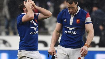 France's Camille Lopez, left, Wenceslas Lauret show their dejection at the end of their loss to Wales in the opening round of the Six Nations. AFP