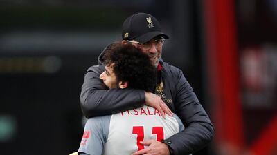Liverpool manager Jurgen Klopp celebrates after the match with Mohamed Salah. Action Images via Reuters