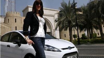 Catherine Langley with her Ford Focus, at the Old Town.