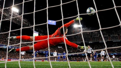 Chelsea goalkeeper Kepa Arrizabalaga saves Dani Parejo's penalty. Reuters