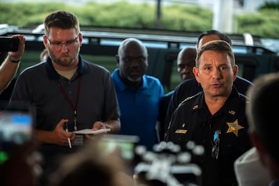 Jacksonville Sheriff Mike Williams, right, briefs the press after the shooting. AP Photo