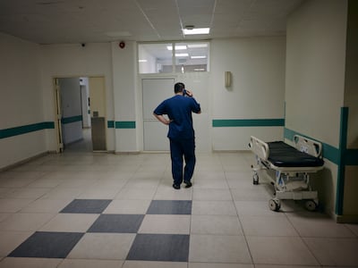 A doctor walks through the Nabih Berri Governmental Hospital in Nabatieh. Benoit Durand / The National