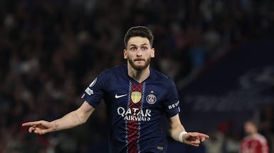 Paris Saint-Germain's Georgian forward #07 Khvicha Kvaratskhelia celebrates scoring his team's second goal during the UEFA Champions League quarter-final first leg football match between Paris Saint-Germain (PSG) and Liverpool FC at the Parc des Princes stadium in Paris on April 8, 2026. (Photo by Anne-Christine POUJOULAT / AFP)