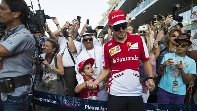 On the grid ahead of the Formula One Etihad Airways Abu Dhabi Grand Prix Yas Marina Circuit in Abu Dhabi. Christopher Pike / The National
