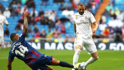 Real Madrid's Karim Benzema in action against Levante's Ruben Vezo. EPA