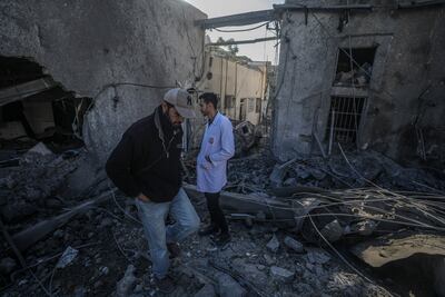 A Palestinian doctor at the site of the destroyed building of Al Ahli Baptist hospital following an Israeli air strike in Gaza City, on April 13 2025. EPA