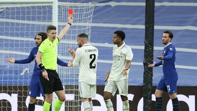 Chelsea's Ben Chillwell is shown a red card by referee Francois Letexier. EPA