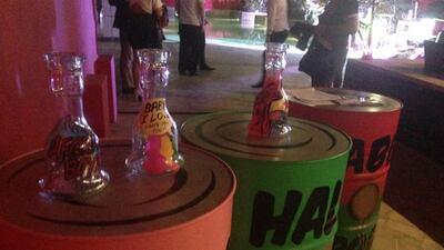 Iqbal's brightly painted oil drums topped with glass shisha bases painted with her pop-art images. Pictures by Mo Gannon / The National