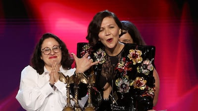 Maggie Gyllenhaal receives the Best Feature award for 'The Lost Daughter'. Reuters