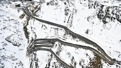 Riders climbing the Stelvio Pass, 2,757m above sea level, during Stage 18 of the Giro d'Italia on Thursday, October 22. AP
