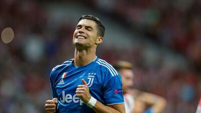 Juventus forward Cristiano Ronaldo reacts after missing a late chance to win the match. AFP