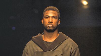 A model walks the runway during the Uniti by Babak Vosoughi Menswear show at Fashion Forward October 2017 held at the Dubai Design District on October 27, 2017 in Dubai, United Arab Emirates.