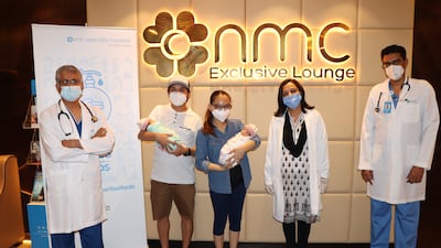 Dr Rakesh Rakesh Sankar, Mariecen's husband Kenneth Zamora, Mariecen, Dr Praveena Saraf and Dr Karvendhan Ramasamy at NMC Specialty Hospital, Al Nahda, in Dubai after a recent check-up.