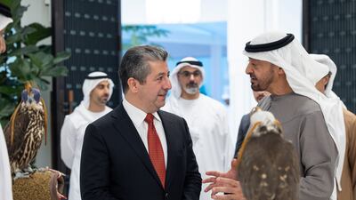 Sheikh Mohamed and Mr Barzani speak as Sheikh Khaled bin Mohamed, Crown Prince of Abu Dhabi, looks on