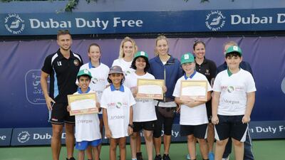 Angelique Kerber with Partner Schools Proramme representatives. Courtesy Dubai Duty Free Tennis Championships