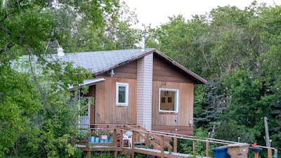A scene where a stabbing occurred is photographed in Weldon, Saskatchewan on Sunday, Sept. 4, 2022. A series of stabbings at an Indigenous community and at another in the village of Weldon left multiple people dead and others wounded, Canadian police said Sunday as they searched for two suspects. (Heywood Yu / The Canadian Press via AP)