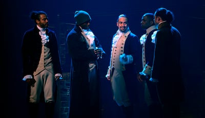 Lin-Manuel Miranda, centre, plays Founding Father Alexander Hamilton in the filmed version of the original Broadway production, 'Hamilton'. AP