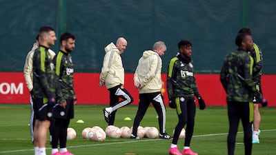 Manchester United manager Erik ten Hag oversees training. PA