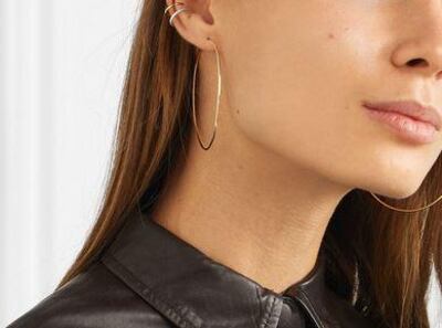 If you invest in one jewellery item this year, it should be a staple pair of hoop earrings. Net-a-Porter / Loren Stewart