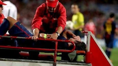 Barcelona's Carles Puyol injured his arm during Wednesday's Champions League game against Benfica..