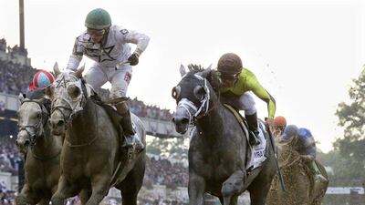 Creator, ridden by Irad Ortiz Jr, left, edges out Destin, ridden by Javier Castellano, to win the 148th running of the Belmont Stakes horse race at Belmont Park, Saturday, June 11, 2016, in Elmont, N.Y. (AP Photo/Julio Cortez)