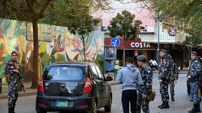 Police officers man a checkpoint near Costa coffee shop in Al Hamra street in Beirut, Lebanon on January 22, 2017. Jamal Saidi / Reuters