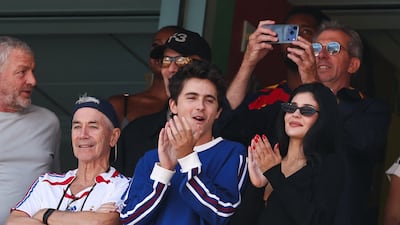 Timothee Chalamet, centre, Kylie Jenner and Marc Chalamet at the final. AFP