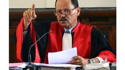 Judge Touhami Hafi at the Tunis Criminal Court yesterday during for the hearing of the two embezzlement cases of money laundering and drug trafficking, against Zine El Abidine Ben Ali , Tunisia's former ruler. Ben Ali, 74, vigorously denied the charges in a statement through his French lawyer, calling the proceedings a 'shameful masquerade of the justice of the victorious'. Hassene Dridi) / AP Photo
