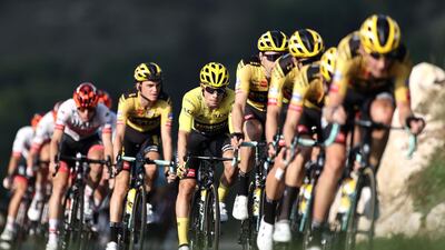 Race leader Primoz Roglic, centre, with his Jumbo-Visma teammates