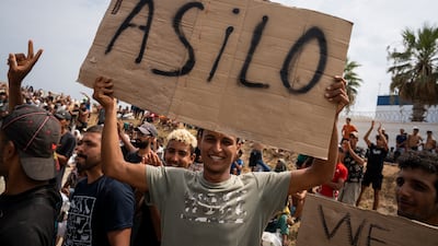 Migrants gathered for a protest on El Trampolin beach in Ceuta at the weekend. Getty Images