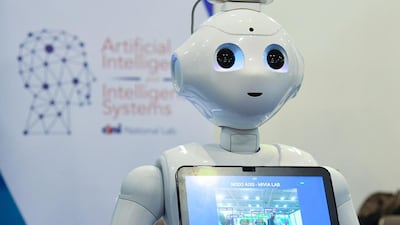 Nearly 77 per cent of UAE respondents prefer to talk to a robot over their manager about stress at work. AFP