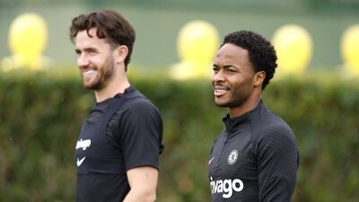 Chelsea's Raheem Sterling, right, and Ben Chilwell during training at Cobham. PA