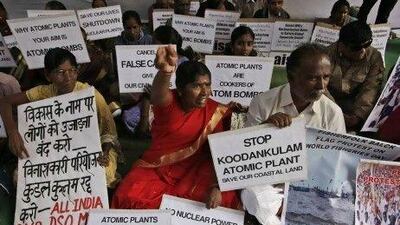 People living near nuclear plant sites shout slogans during an anti-nuclear protest in New Delhi.