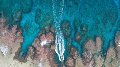 Jay Warren navigates the Rib through the only channel to land on the North beach. Iain McGregor/STUFF