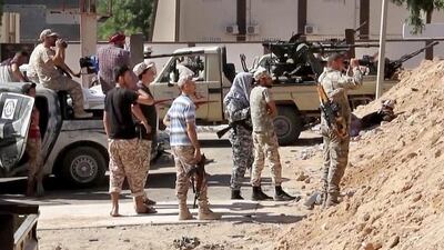 Armed Misurata fighters loyal to the unity government on the main street of Sirte as pro-government forces wage an offensive to dislodge ISIL militants from the coastal city. AP Video via AP